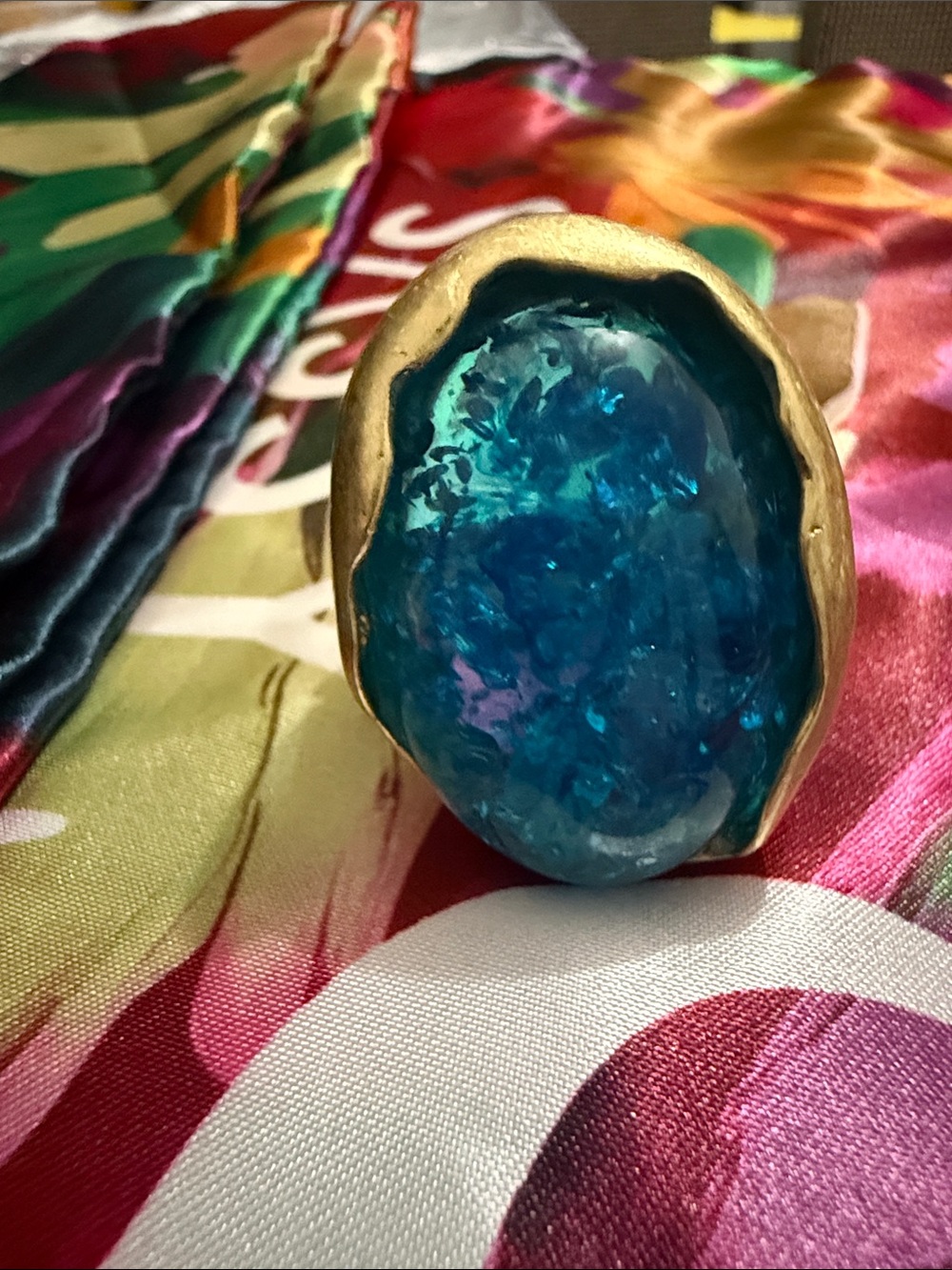 Gold-Tone Ring with Turquoise Center. Stretchy.